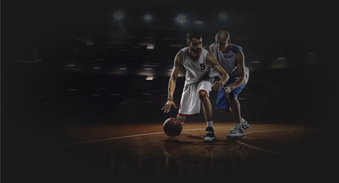 Two basketball players on a court.